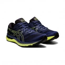 Asics Men's Gel-Nimbus 23 Running Shoe - Thunder Blue/Glow Yellow - Regular (D) 9 Asics Men's Gel-Nimbus 23 Running Shoe - Thunder Blue/Glow Yellow - Regular (D)