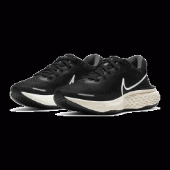 Nike Women's ZoomX Invincible Run Flyknit Running Shoe - Black/White/Iron Grey - Regular (B) 12 Nike Women's ZoomX Invincible Run Flyknit Running Shoe - Black/White/Iron Grey - Regular (B)