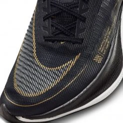 Nike Men's ZoomX Vaporfly Next % 2 Racing Shoe - Black/White/Metallic Gold Coin - Regular (D) 14 Nike Men's ZoomX Vaporfly Next % 2 Racing Shoe - Black/White/Metallic Gold Coin - Regular (D)