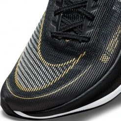 Nike Women's ZoomX Vaporfly Next % 2 Racing Shoe - Black/White/Metallic Gold Coin - Regular (B) Shoes 14 Nike Women's ZoomX Vaporfly Next % 2 Racing Shoe - Black/White/Metallic Gold Coin - Regular (B) Shoes