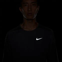Apparel Men's Nike Dri-FIT Miler Long Sleeve Running Top - Black/Reflective Silver 12 Apparel Men's Nike Dri-FIT Miler Long Sleeve Running Top - Black/Reflective Silver