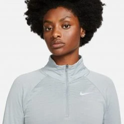 Tops Women's Nike Therma-FIT Element 1/2-Zip Running Top - Particle Grey/Reflective Silver 12 Tops Women's Nike Therma-FIT Element 1/2-Zip Running Top - Particle Grey/Reflective Silver