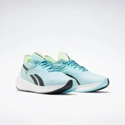 Reebok Women's Floatride Energy Symmetros Running Shoe - Digital Glow/Chalk Blue/Neon Mint - Regular (B) 12 Reebok Women's Floatride Energy Symmetros Running Shoe - Digital Glow/Chalk Blue/Neon Mint - Regular (B)