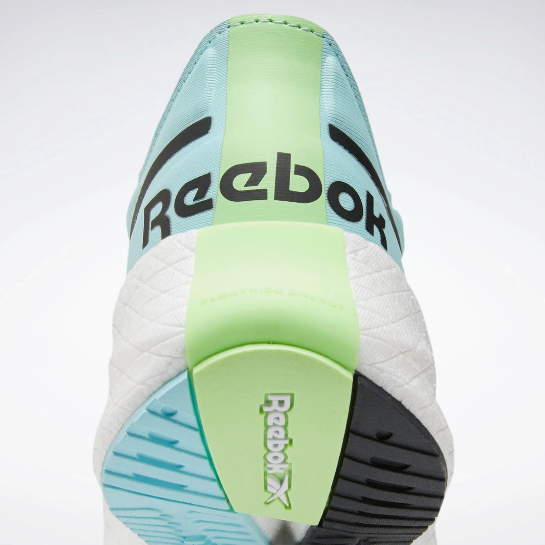 Reebok Women's Floatride Energy Symmetros Running Shoe - Digital Glow/Chalk Blue/Neon Mint - Regular (B) 9 Reebok Women's Floatride Energy Symmetros Running Shoe - Digital Glow/Chalk Blue/Neon Mint - Regular (B)