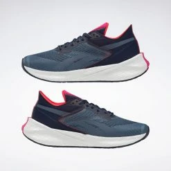 Reebok Women's Floatride Energy Symmetros Running Shoe - Vector Navy/Blue Slate/Pursuit Pink - Regular (B) 13 Reebok Women's Floatride Energy Symmetros Running Shoe - Vector Navy/Blue Slate/Pursuit Pink - Regular (B)