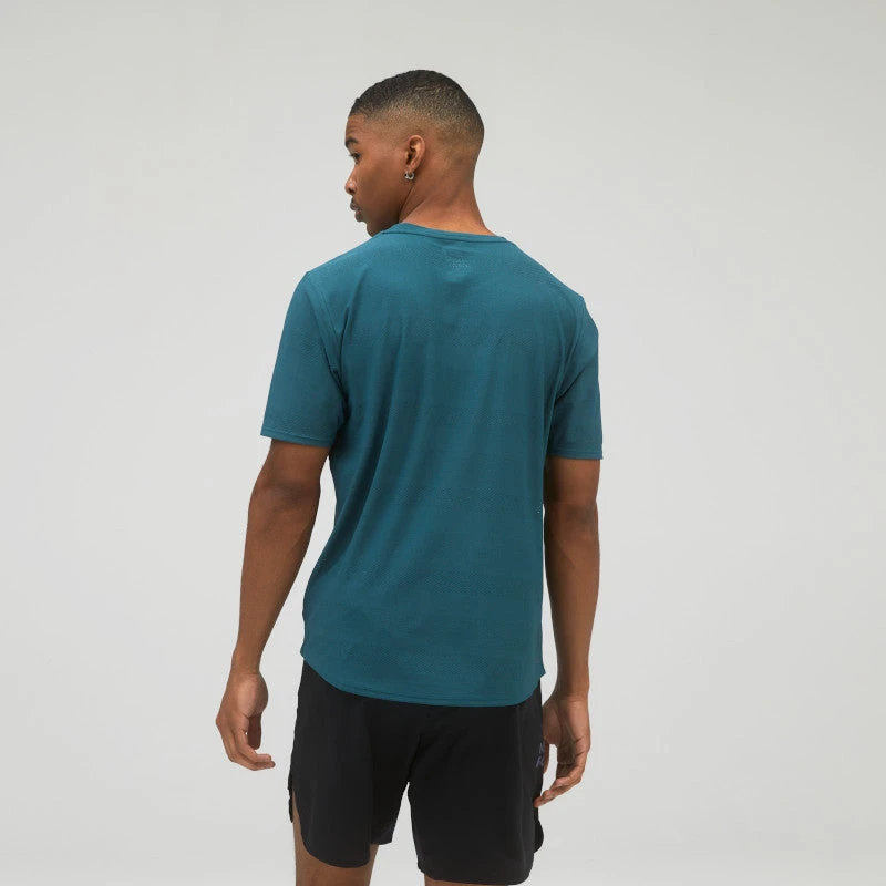 New Balance Apparel Men's Q Speed Jacquard Short Sleeve Top- Mountain Teal 2 New Balance Apparel Men's Q Speed Jacquard Short Sleeve Top- Mountain Teal